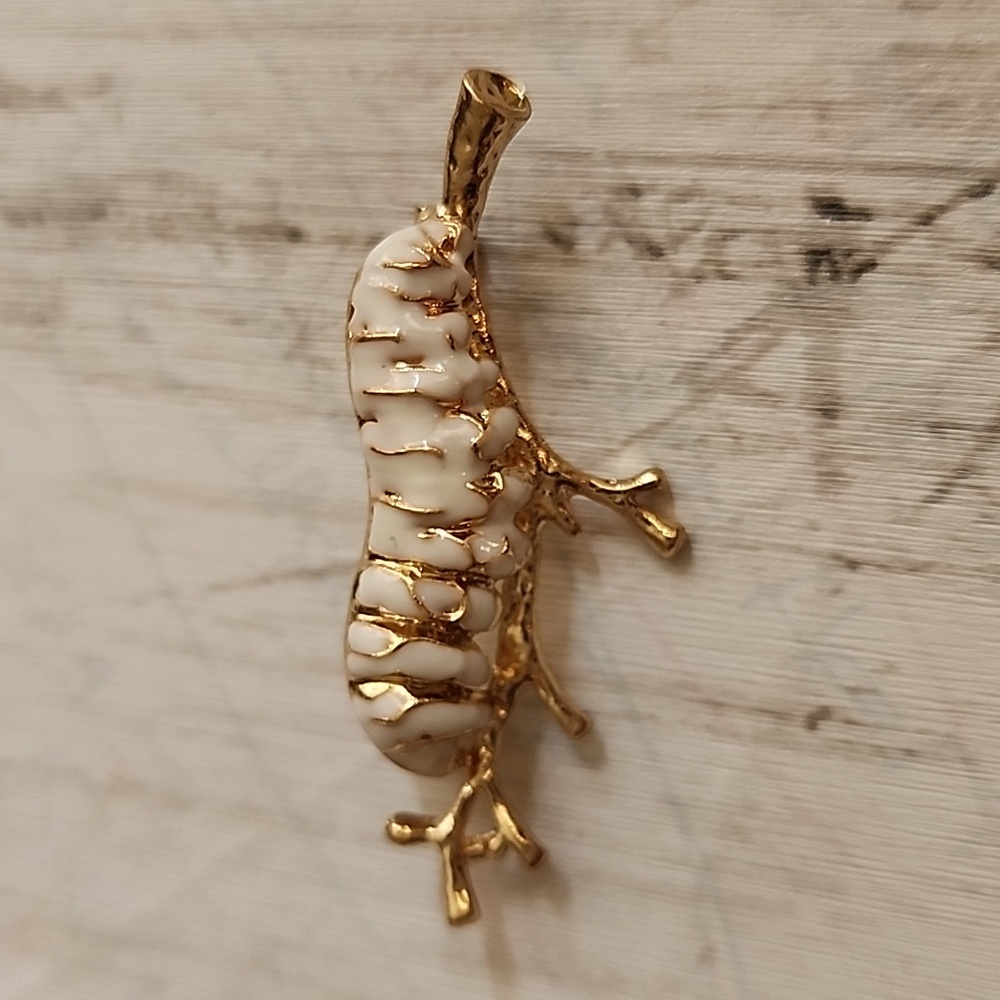 Caterpillar  Brooch on a gold tone Branch